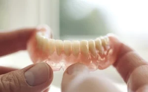 How To Keep Dentures In Place Without Adhesive